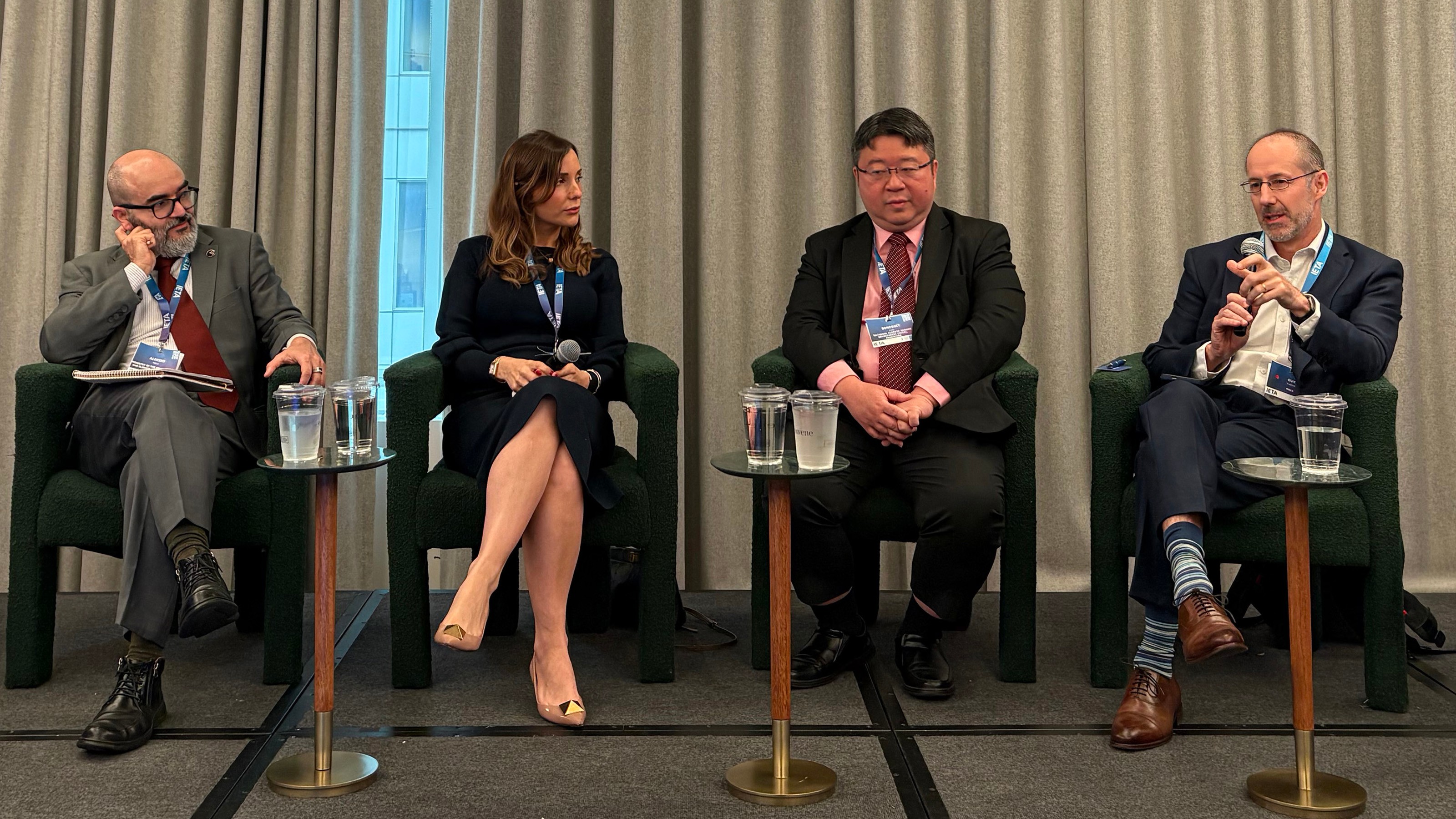 Guy Turner, head of MSCI Carbon Markets, speaking on stage with Aloísio Melo of Brazil’s Ministry of Environment and Climate Change, Hannah Hauman of Trafigura, and Benedict Chia of Singapore’s National Climate Change Secretariat during a panel on global carbon markets at the IETA North America Climate Summit 2025.