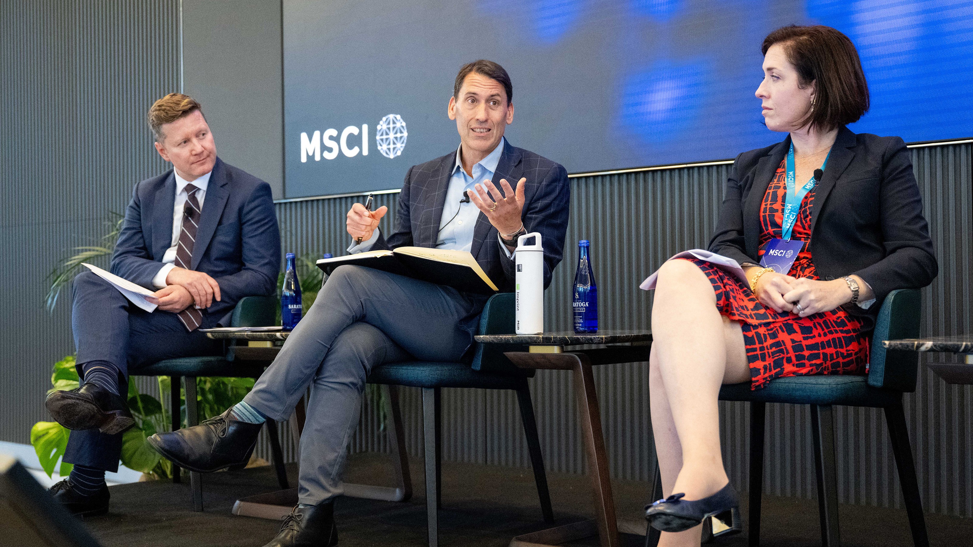 Richard Mattison of MSCI, John Goldstein of Goldman Sachs Wealth Management, and Jamie Franco of TCW seated on stage at MSCI’s Americas Summit.